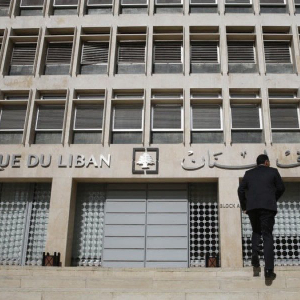 Lebanese citizens face cash crisis as the central bank imposes withdrawal restrictions.