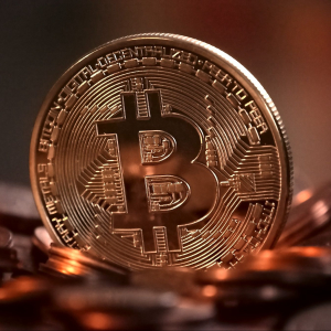 Bitcoin price soars, back above $7,000