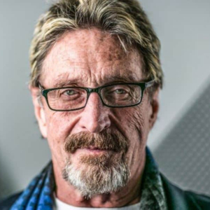 John McAfee Explains GHOST Plagiarism Comparing It To Bitcoin to BTC Forks